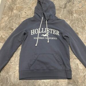 it’s a hollister deep ish blue with pockets